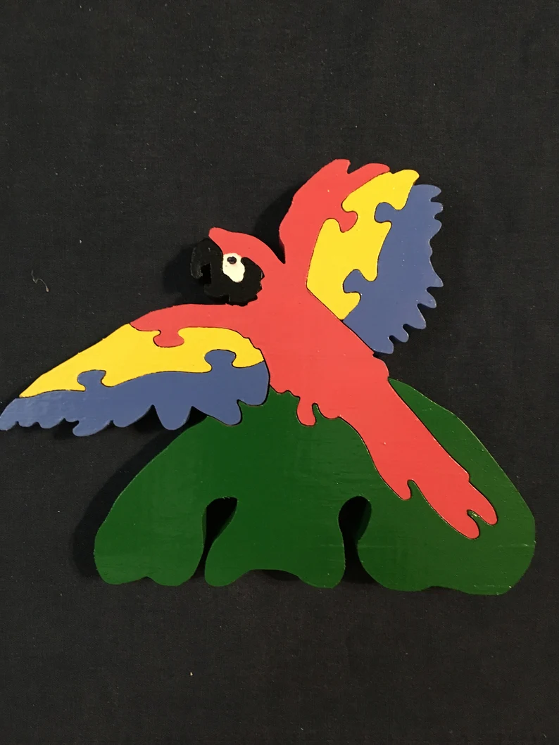 Painted colorful wooden macaw puzzle