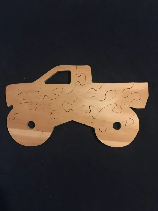 Wooden puzzle of a monster truck