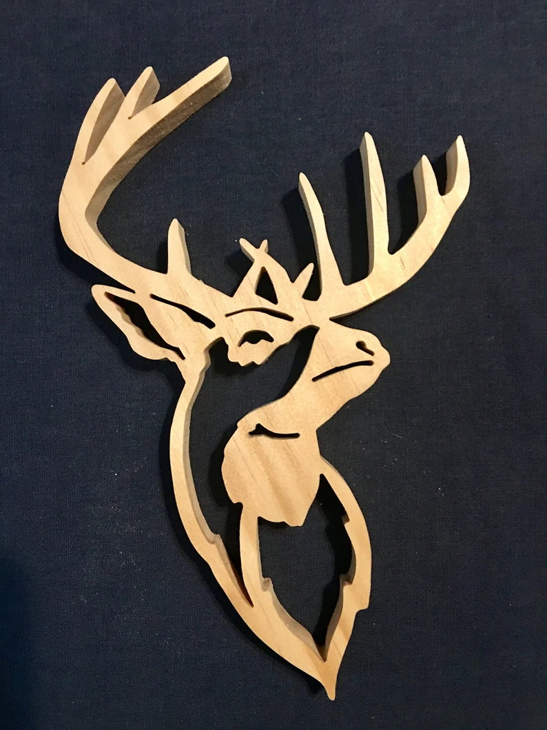 Wooden deer head made with a scroll saw