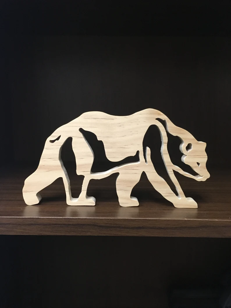 wooden bear that has been scroll sawed