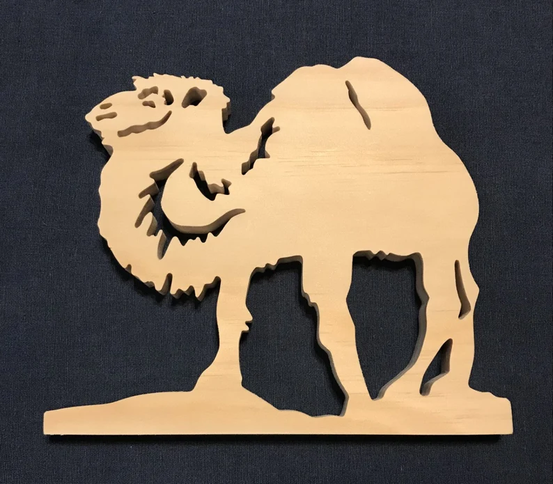 wooden camel that has been saw scrolled