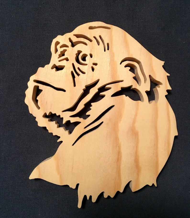 wooden chimpanzee head that has been wood scrolled