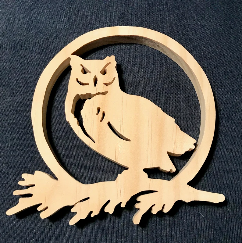 wooden owl in a circle