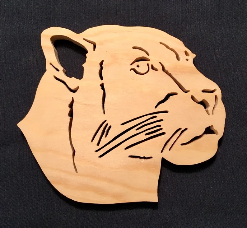 wooden panther head that was scroll sawed